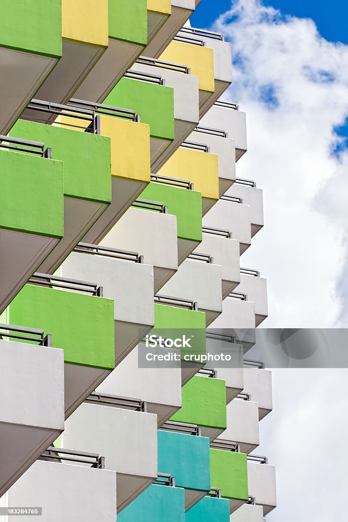 Colorful balconies in front of a an atmospheric sky Urban Habitations Architectural Feature Stock Photo