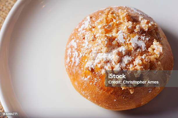 Fresh Praline Brioche Sits On A Plate Stock Photo - Download Image Now - Bakery, Bread, Breakfast