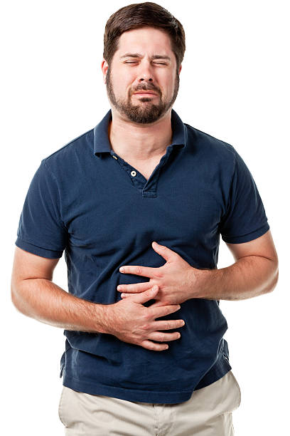 Man With Upset Stomach stock photo