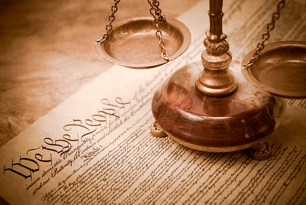 istock Constitution and scales of justice 183284885