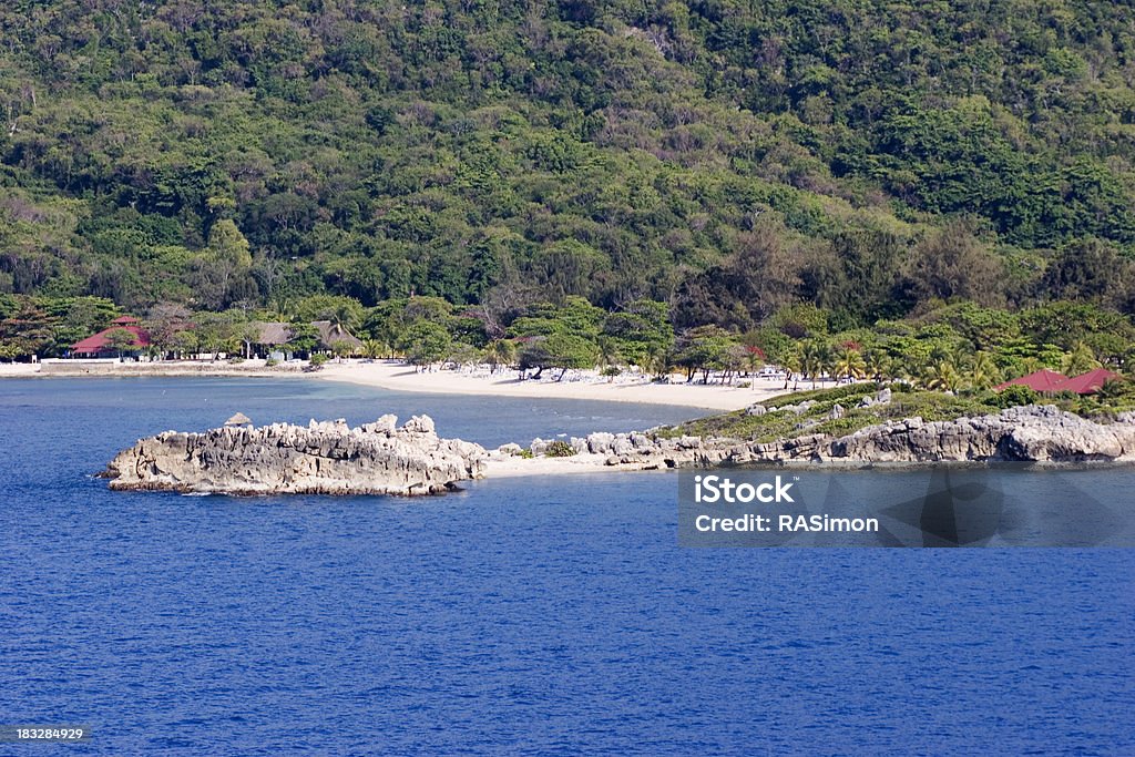 Tropical Coastline Rocky point and sandy beach - tropical paradise. Labadee Stock Photo