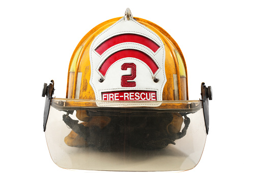 Yellow firefighter's helmet with firefighter shield with number 2 and Fire-Rescue on it.