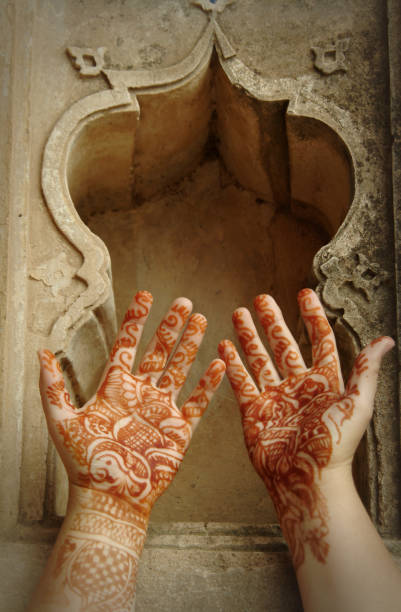 Choose the design Henna hands in an indian arch tribal art photos stock pictures, royalty-free photos & images