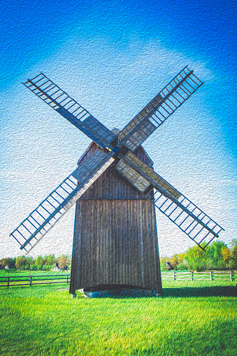 Old wooden windmill made in 1864, type post mill earliest of european windmills, oil painting effect image