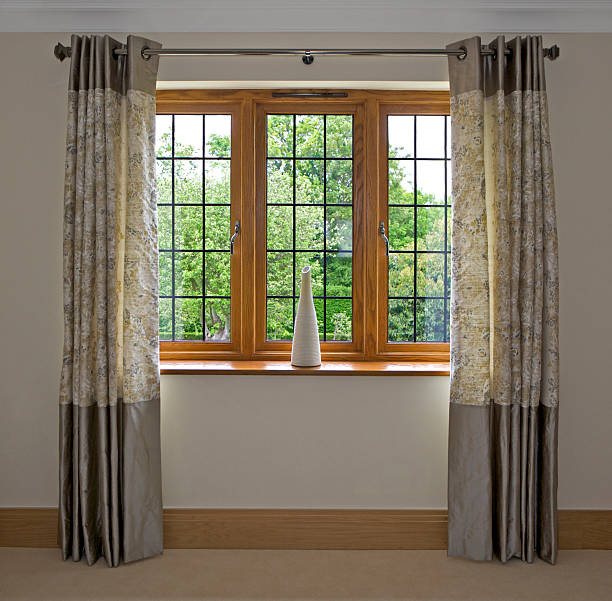 istock Mohogany window and silk curtains 183286173