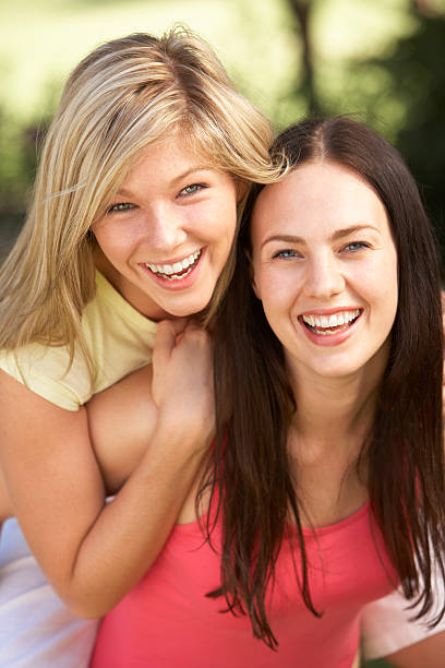 istock Two Female Friends Relaxing Together 183286194