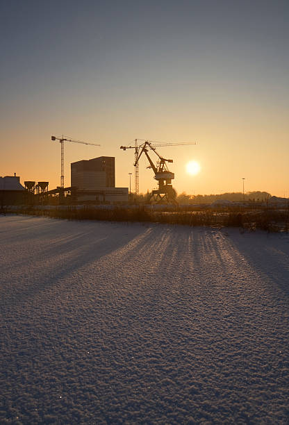 istock Industrial port at sunset in winter 183286362