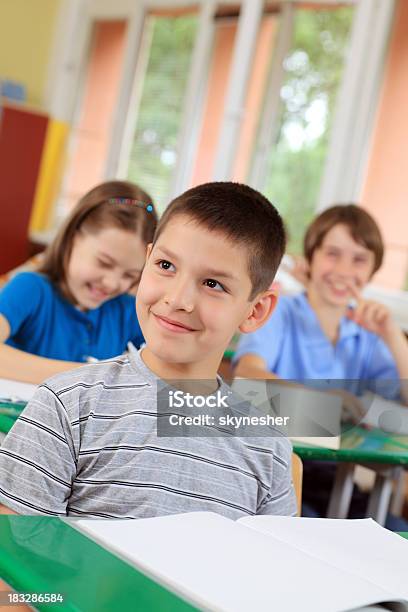 Children Sitting On A Lesson In School Stock Photo - Download Image Now - Adult Student, Boys, Cheerful