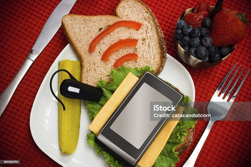 Mobile Phone Sandwich "Business lunch complete with a mobile phone sandwich, with cheese and lettuce, pickle, and an ear bud olive on whole wheat bread...healthy & social!  Please visit my" Abstract Stock Photo