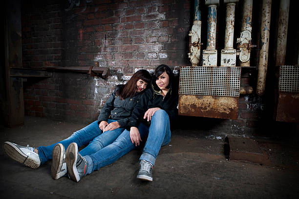 istock Two woman sitting in old factory 183286774