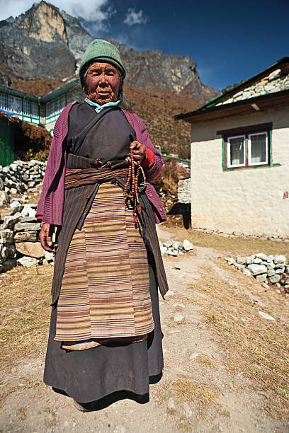 Nepali woman with rosary