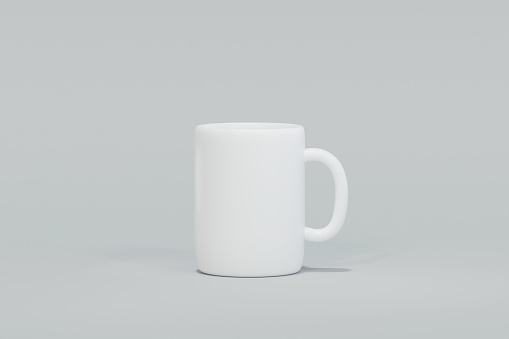 Classic White Coffee Mug isolated on grey background.