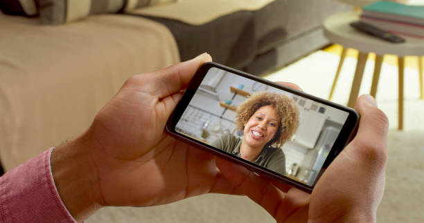 istock Smiling woman during video call 1832875719