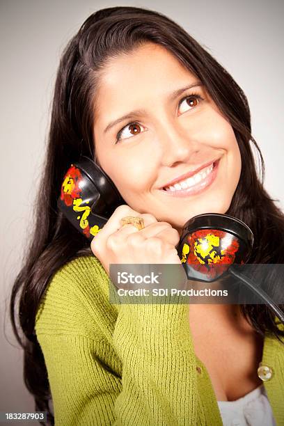 Happy Young Woman Using Funky Telephone Stock Photo - Download Image Now - Achievement, Adult, Adults Only