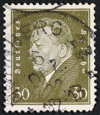 German postage stamp isolated on black