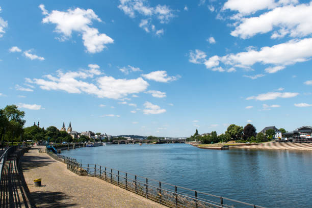 View from the Deutsches Eck (German Corner), where The Moselle meets the river Rhine, at the skyline of Koblenz in Germany.