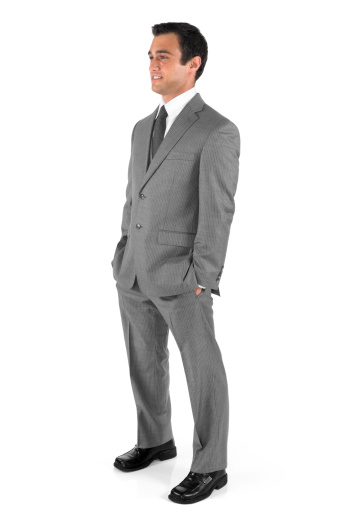 Businessman standing with hands in pocketshttp://www.twodozendesign.info/i/1.png
