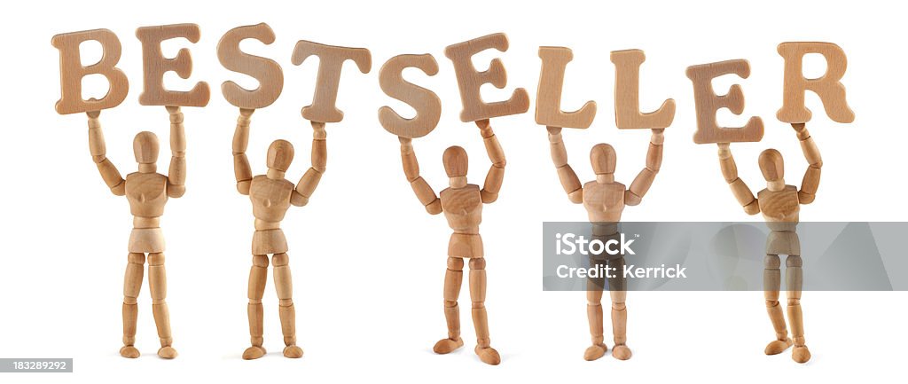 Bestseller-Hölzerne Kleiderpuppe holding die Wort - Lizenzfrei Alphabet Stock-Foto