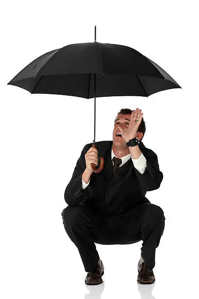 Photo of Businessman under an umbrella