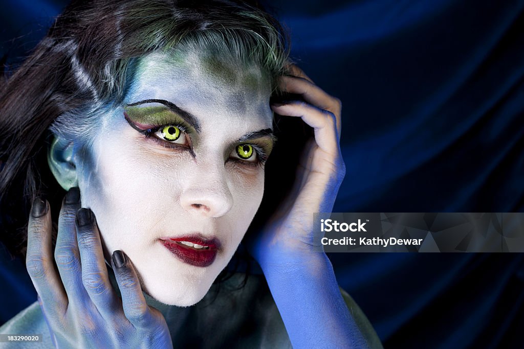 Beautiful Sea Creature Woman In Blue Body Paint Stock Photo - Download  Image Now - Contact Lens, Color Image, Costume - iStock