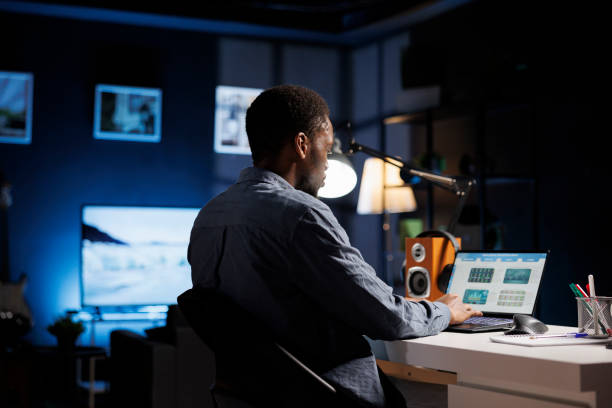 istock Young research specialist looks at financial elements 1832901731