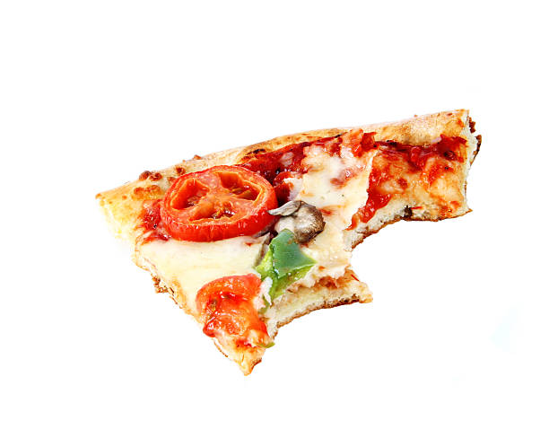 vegetarian pizza slice half eaten stock photo