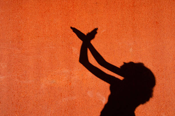 istock Shadow of a woman on rusted metal 183290810
