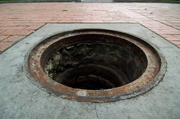 Missing manhole cover The theft of manhole covers is a serious problem throughout latin america. Homeless steal the covers and sell them to metal trades which then melt them down. The price paid for one of these covers is about $5 or less. In December of 2005 a child fell into one of these holes while playing and drowned to death. sewer lid stock pictures, royalty-free photos & images