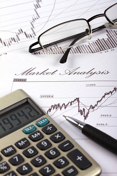 istock Stock market chart with pen and calculator 183291062