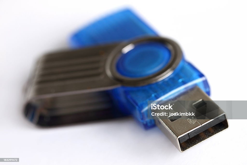 USB Flash drive isolated on white With extreme Shallow Depth of Field (f/2.8).Other choice below: Close-up Stock Photo