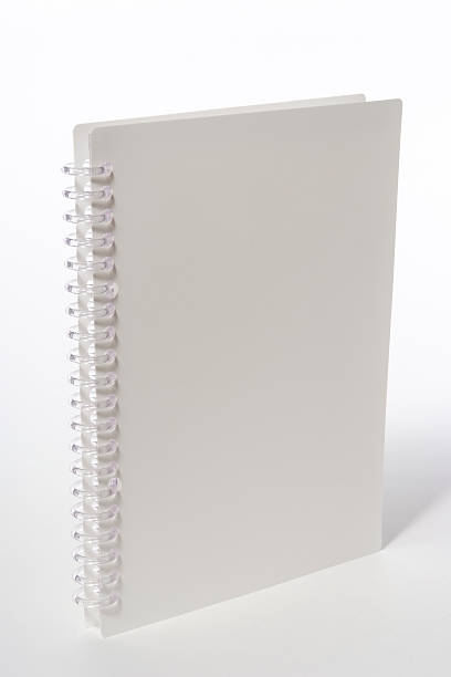 istock Isolated shot of blank spiral notebook on white background 183291520