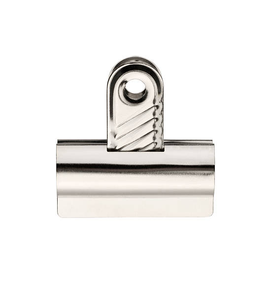 Silver Bulldog clip with clipping path A studio shot of a silver bulldog clip isolated on a white backgroundwith clipping path clip stock pictures, royalty-free photos & images