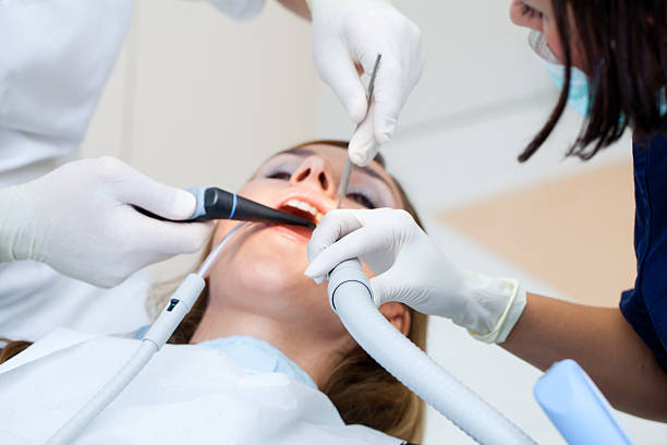 istock Beautiful young girl at the dentist 183292100