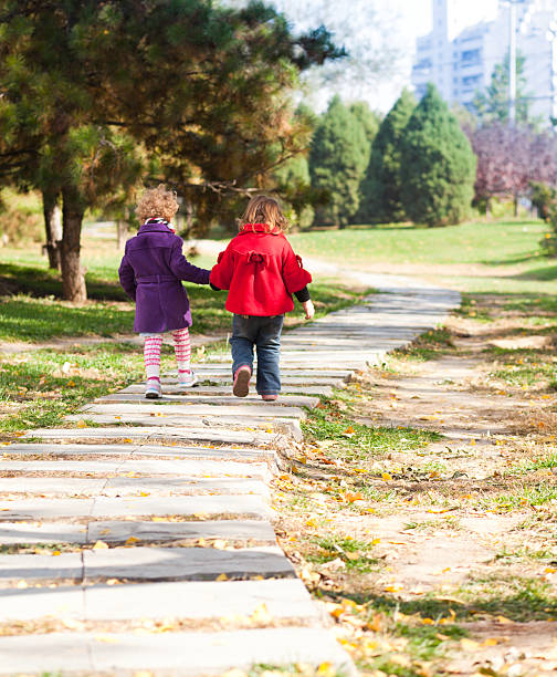 duas jovens senhoras - preschooler autumn beautiful blond hair imagens e fotografias de stock