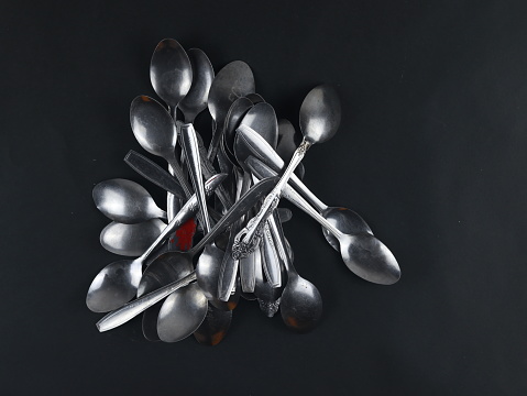 Stainless spoon isolated on black background