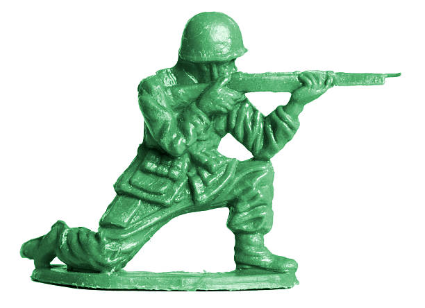 Toy soldier taking aim Toy soldier macro. toy soldier stock pictures, royalty-free photos & images