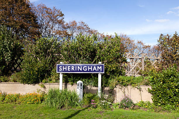 istock Traditional old style railway station sign at Sheringham, Norfolk 183293826