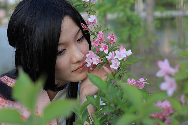 istock young women and flower 183294478