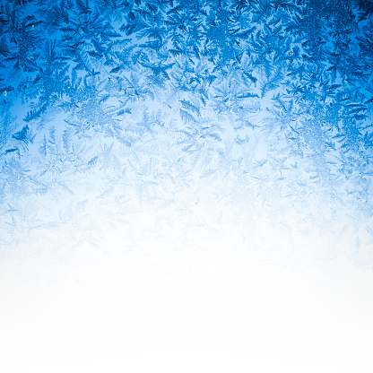 Blue winter ice textured background.