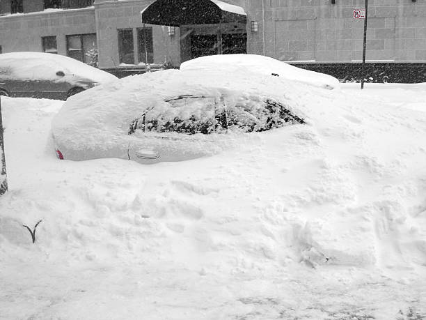 Snow-Covered Car After a Blizzard stock photo