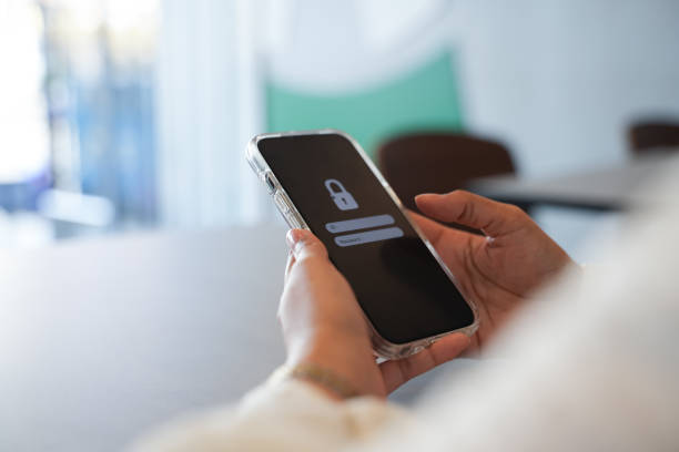 istock Cyber security concept with people holding smartphone screen show login. 1832948399