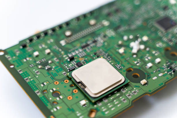 istock close up of PCB board and chip IC, Electronic circuit board, Electronic part. Main IC on board. 1832949486