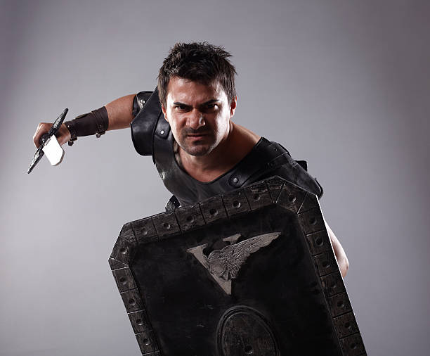gladiator - gladiator sword warrior men стоковые фото и изображения