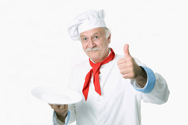 chief Chef holding empty plate chefs whites stock pictures, royalty-free photos & images