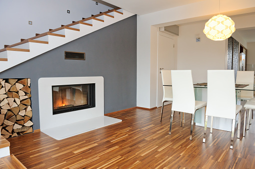 Modern interior, living room with view on fire place. Luxury