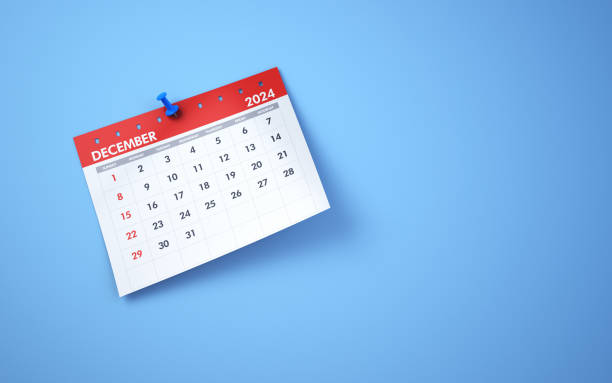 istock December 2024 Calendar on Blue Background, Blue pushpin 1832958950