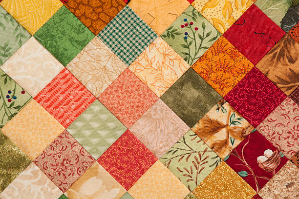 trapunta sfondo - quilt patchwork sewing textile foto e immagini stock