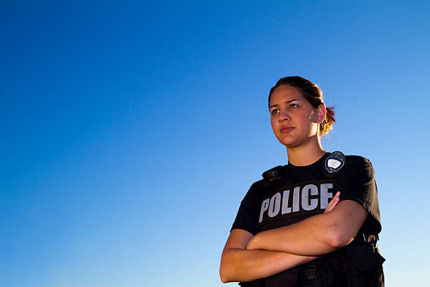 A Hispanic police woman.