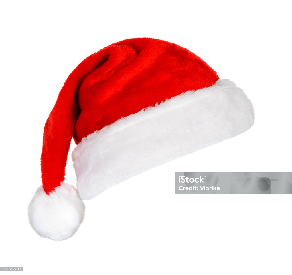 A festive red and white Santa hat on a white background Santa Hat isolated on white. Santa Hat Stock Photo