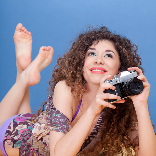istock Young girl playing with the camera 183297447